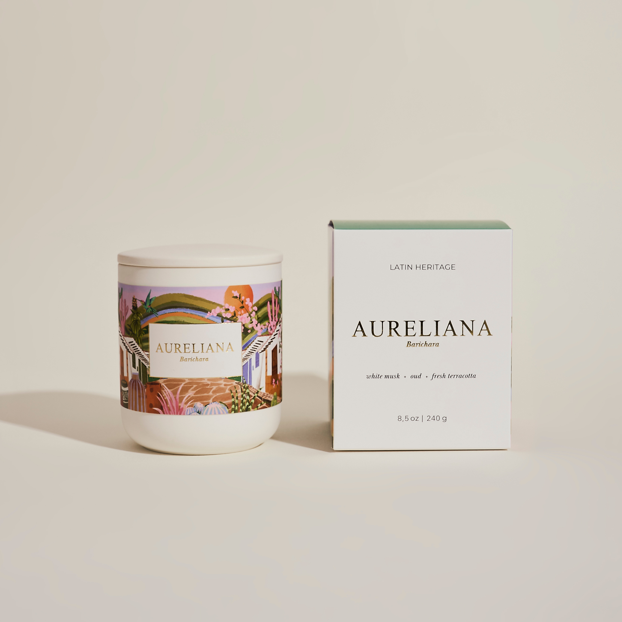 Candle and packaging of Aureliana brand on a light background